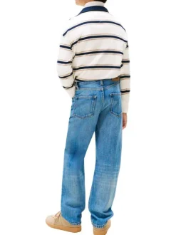 Jean en coton bleu uni coupe regular avec le patch de la marque à l'arrière