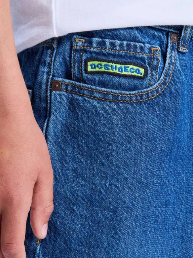 Jean en coton indigo uni avec une coupe droite et de multiples poches