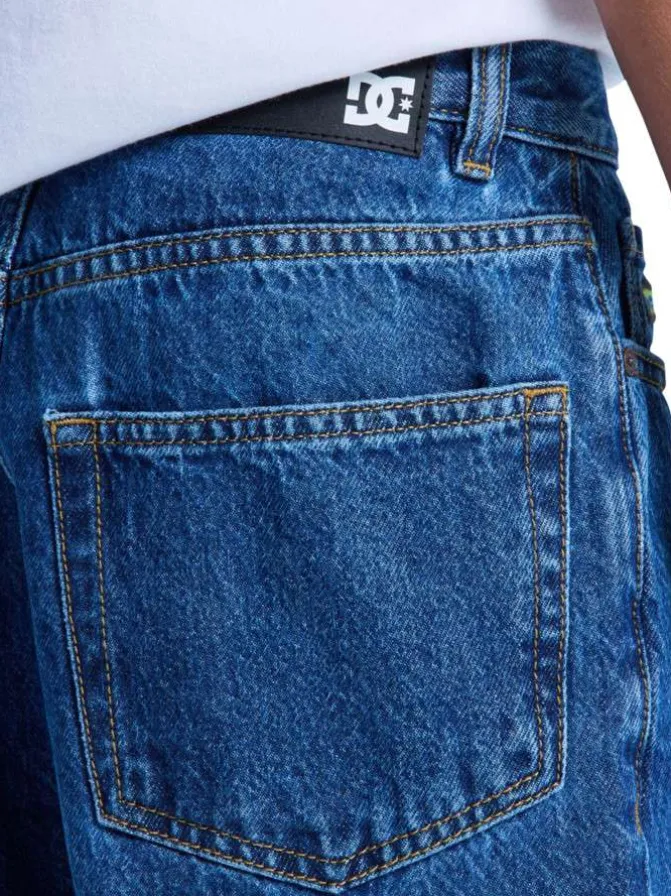 Jean en coton indigo uni avec une coupe droite et de multiples poches