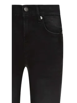 Jean en coton noir délavé avec une coupe slim et une taille basse