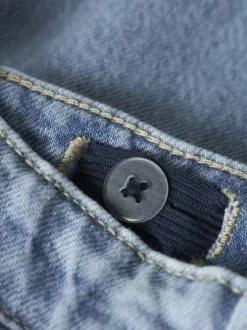 Jean en coton stone pourvu de multiples poches et d'une coupe droite