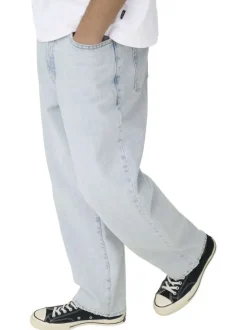 Jean Baggy en coton beige uni avec une coupe droite à zip et à bouton