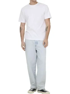 Jean Baggy en coton beige uni avec une coupe droite à zip et à bouton