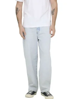 Jean Baggy en coton beige uni avec une coupe droite à zip et à bouton