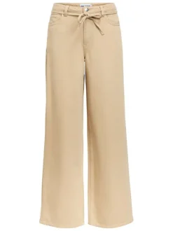 Jean beige uni pourvu d'une coupe bootcut et d'un lien à nouer à la taille