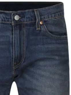 Jean 512 bleu délavé avec une coupe slim et une taille intermédiaire