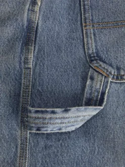Jean bleu effet délavé avec une coupe regular fit et une taille haute