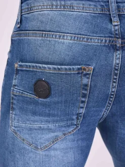 Jean bleu en coton effet délavé avec une coupe slim et une taille Intermédiaire