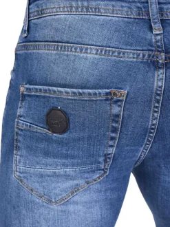Jean bleu en coton effet délavé avec une coupe slim et une taille Intermédiaire