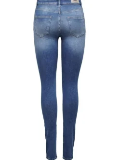Jean bleu femme avec une coupe skinny effet délavé et un patch d'authenticité