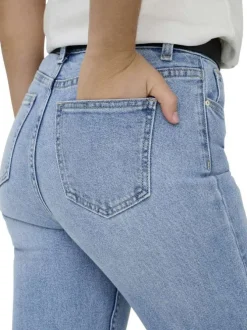 Jean bleu stone uni avec une coupe slim et un zip et un bouton
