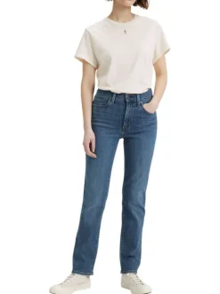 Jean 724 bleu uni avec une coupe slim une taille haute et des passants