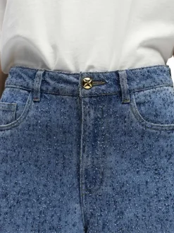 Jean bleu uni pourvu d'une coupe bootcut et d'un taille intermédiaire