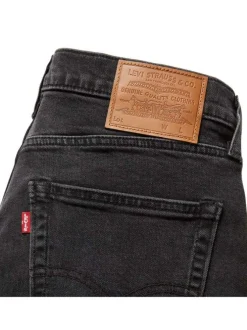 Jean 512 brut uni avec une coupe slim et un patch d'authentification