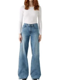Jean 728 coupe wide leg en coton bleu pourvu de coutures contrastées