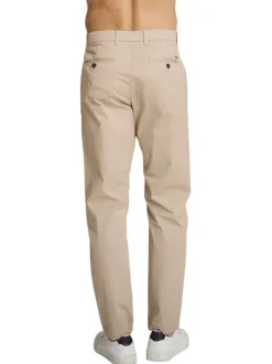 Jean en coton beige à coupe ajustée pourvu de multiples poches