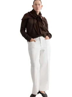 Jean en coton blanc uni pourvu d'une coupe bootcut et d'une taille haute