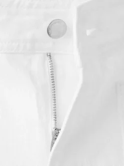 Jean en coton blanc uni pourvu d'une coupe bootcut et d'une taille haute