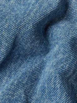 Jean en coton bleu avec une coupe droite et des passants à la taille