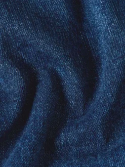 Jean en coton bleu avec une coupe droite et des passants pour ceinture