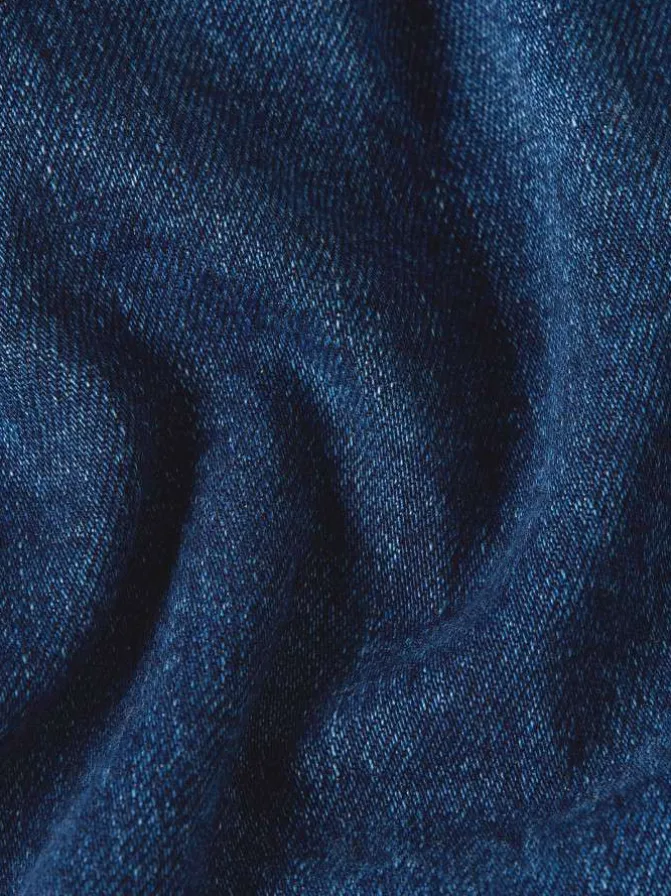 Jean en coton bleu avec une coupe droite et des passants pour ceinture