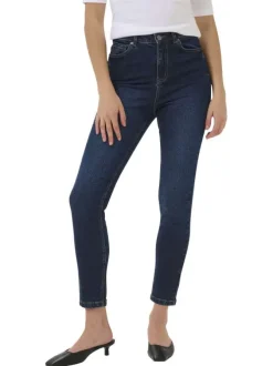 Jean en coton bleu brut délavé avec une coupe slim et 5 poches