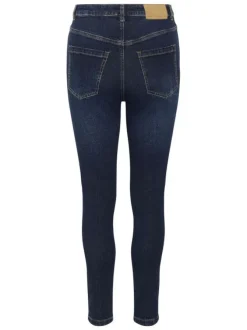 Jean en coton bleu brut délavé avec une coupe slim et 5 poches