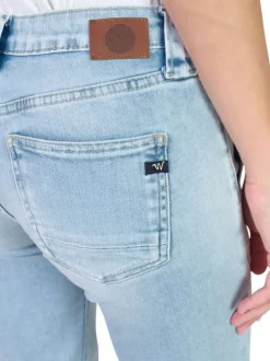 Jean en coton bleu coupe wide leg pourvu d'un ruban à nouer à la taille