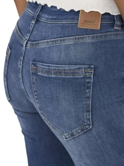 Jean en coton bleu délavé aux cuisses à coupe bootcut et à taille-mi-haute