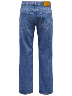 Jean en coton bleu délavé avec une coupe regular fit et une braguette à boutons