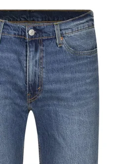 Jean 511 en coton bleu délavé avec une coupe slim et surpiqûres jaunes