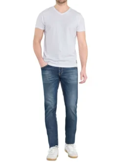 Jean en coton bleu délavé avec une coupe slim et un style 5 poches