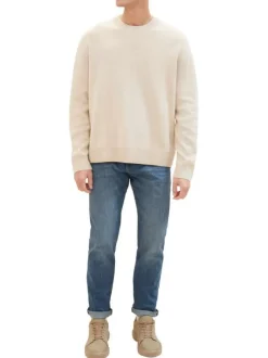 Jean en coton bleu indigo délavé aux cuisses avec une coupe slim fit