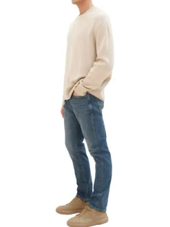 Jean en coton bleu indigo délavé aux cuisses avec une coupe slim fit