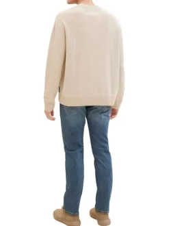 Jean en coton bleu indigo délavé aux cuisses avec une coupe slim fit