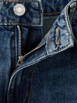Jean en coton bleu indigo délavé avec une coupe bootcut et 5 poches