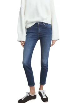 Jean en coton bleu indigo délavé avec une coupe slim et 5 poches
