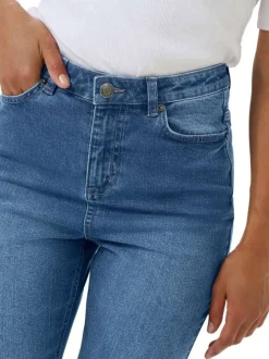 Jean en coton bleu indigo délavé avec une coupe slim et 5 poches
