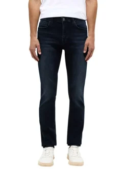Jean en coton bleu indigo délavé avec une taille mi-haute et une coupe slim