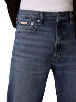 Jean en coton bleu indigo légèrement délavé à coupe regular fit