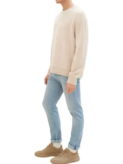 Jean en coton bleu stone délavé aux cuisses avec une coupe slim fit