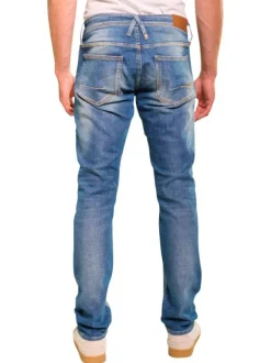 Jean en coton bleu stone délavé aux cuisses avec une coupe slim fit