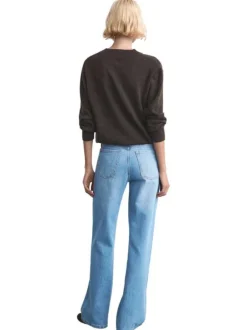 Jean en coton bleu stone délavé avec une coupe bootcut et 5 poches