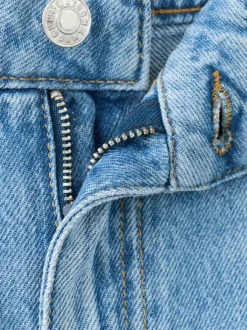 Jean en coton bleu stone délavé avec une coupe bootcut et 5 poches