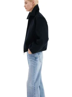 Jean en coton bleu stone délavé avec une coupe bootcut et 5 poches