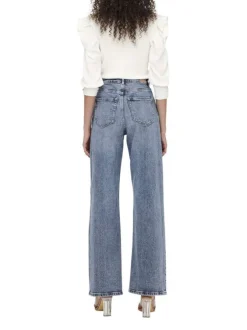 Jean en coton bleu stone délavé avec une coupe bootcut et une taille haute