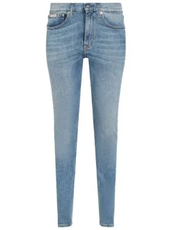 Jean en coton bleu stone délavé avec une coupe slim et une taille intermédiaire