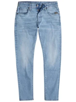 Jean en coton bleu stone légèrement délavé avec une coupe slim