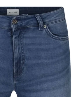 Jean en coton bleu uni avec une coupe bootcut et une fermeture zippée