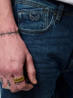 Jean en coton bleu uni avec une coupe droite et des passants à la taille